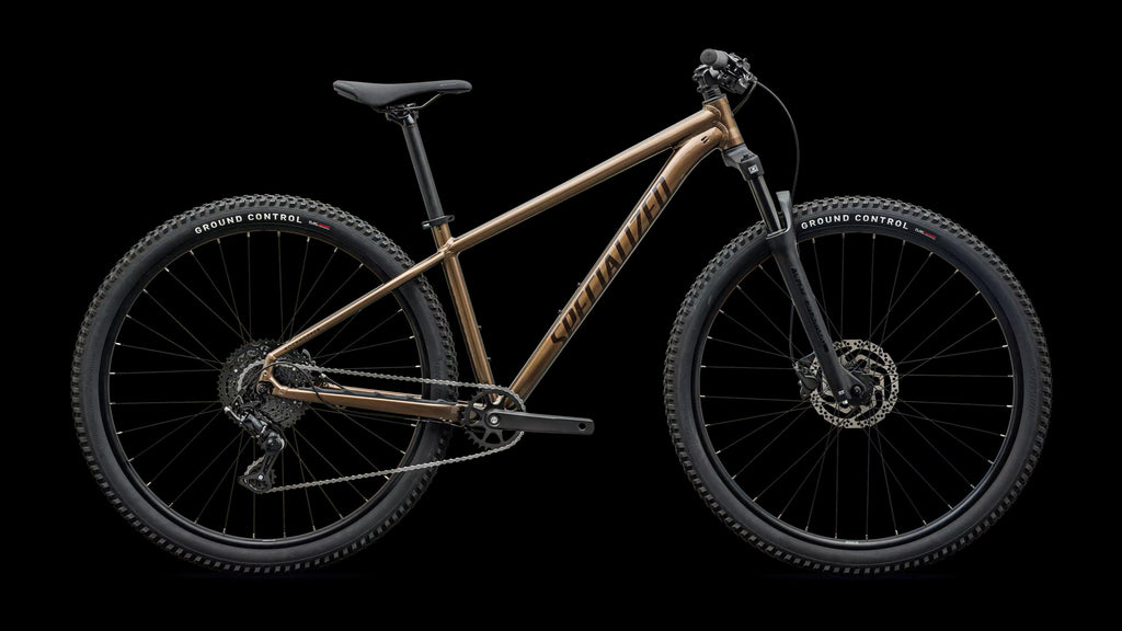 Rockhopper Sport (2027) — Gloss Burnt Gold Metallic / Stallion Metallic — side view