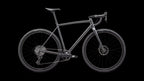 Crux DSW Comp - SRAM Apex XPLR (2025) — Satin Smoke/Oak Green — side view
