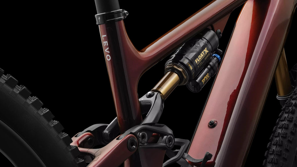 S-Works Turbo Levo 4 (2026) — Gloss Red Pearl / Black / Metallic White Silver — detail 400