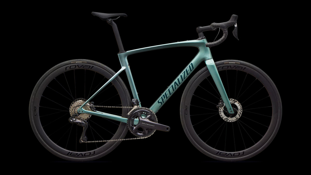 Roubaix SL8 Expert - Shimano Ultegra Di2 (2026) — Gloss Fjord Metallic/White Pearl Fade/Emerald Metallic — side view